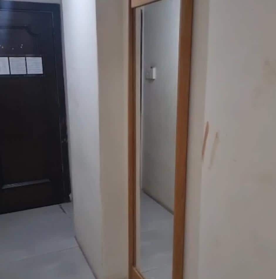 Ruined walls, dirty and unpainted.