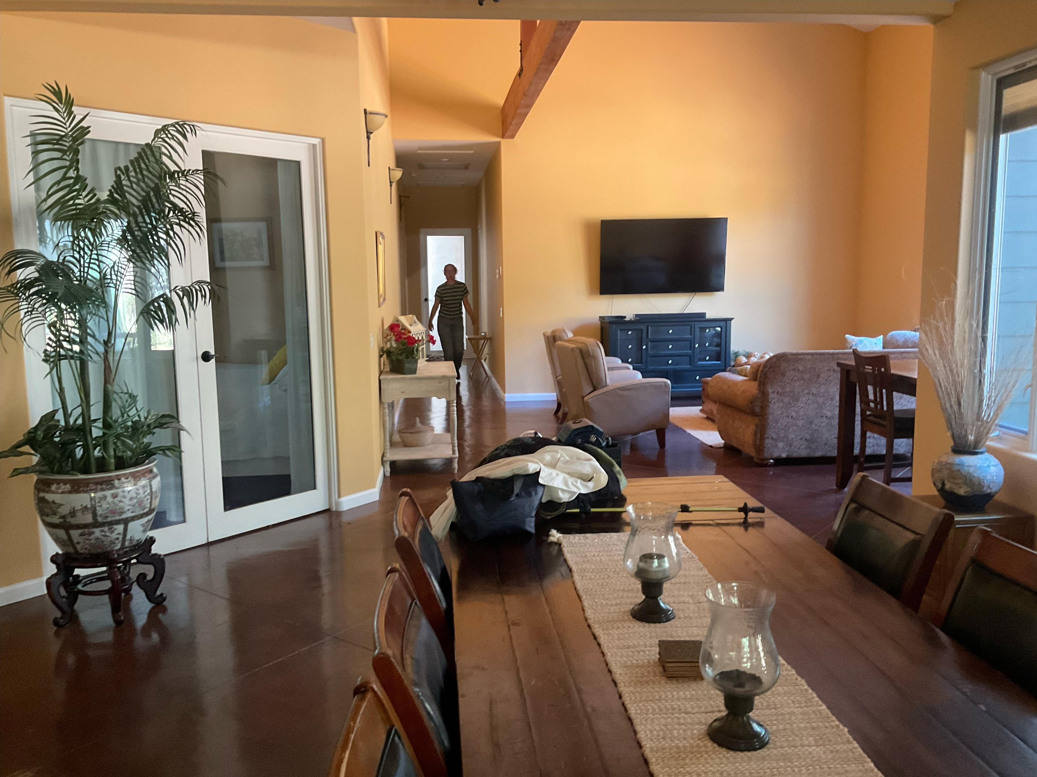 Big harvest table and another one on  the patio. 