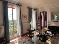 In the living room, looking out.