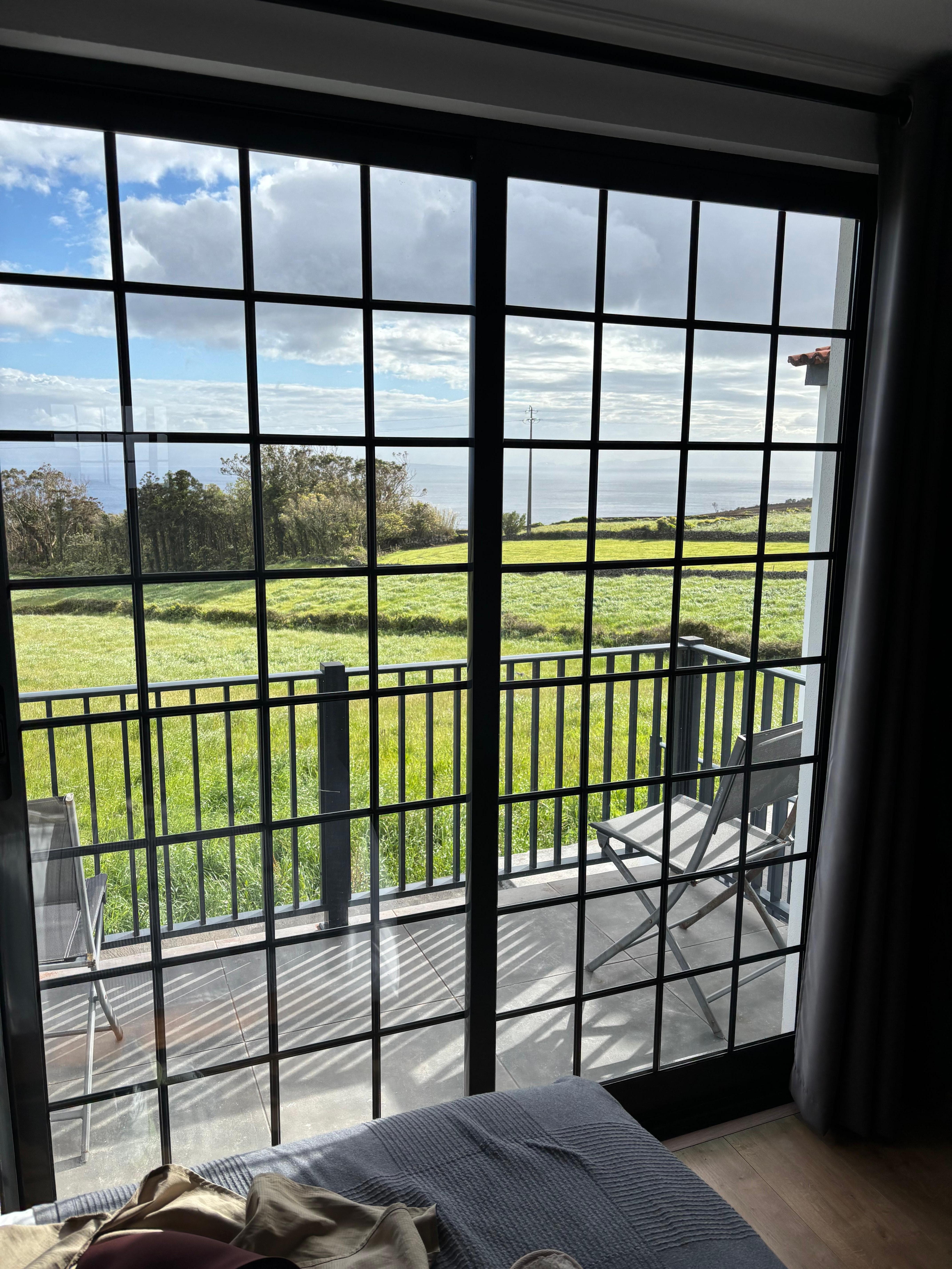 Our sliding door, doors and little balcony from the upstairs bedroom