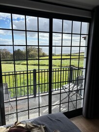 Our sliding door, doors and little balcony from the upstairs bedroom