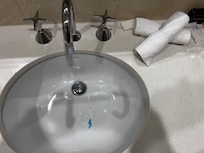 Basin not cleaned.