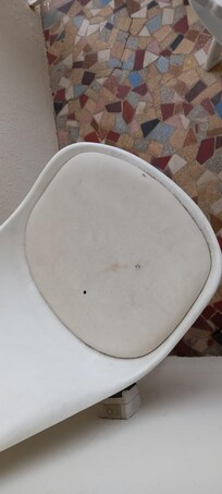 Cigarette burns on balcony chairs