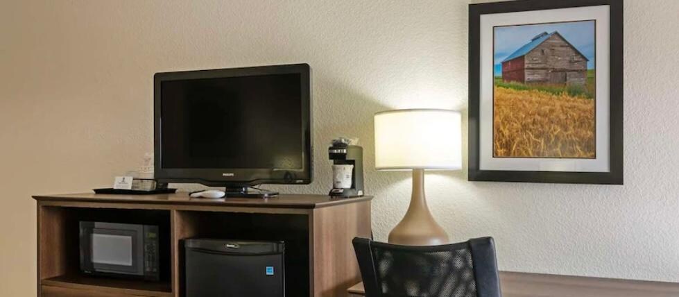 Microwave and refrigerator. Very clean room and bathroom (bathroom has an outer sink as well as in the bathroom)