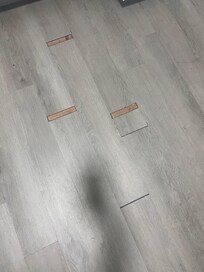 Unfinished floors. Gaps and cracks all over.