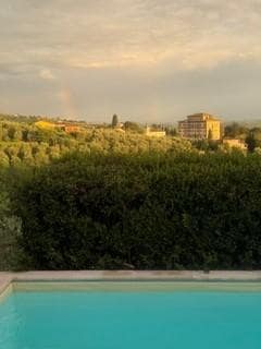 Your view from the pool/front of the house.  This is also your view from the dining room and living room, and two of the upstairs beds/one of the baths.  All windows in the house open and have screens- views are stunning from all.  