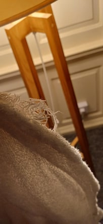 Frayed bathrobe