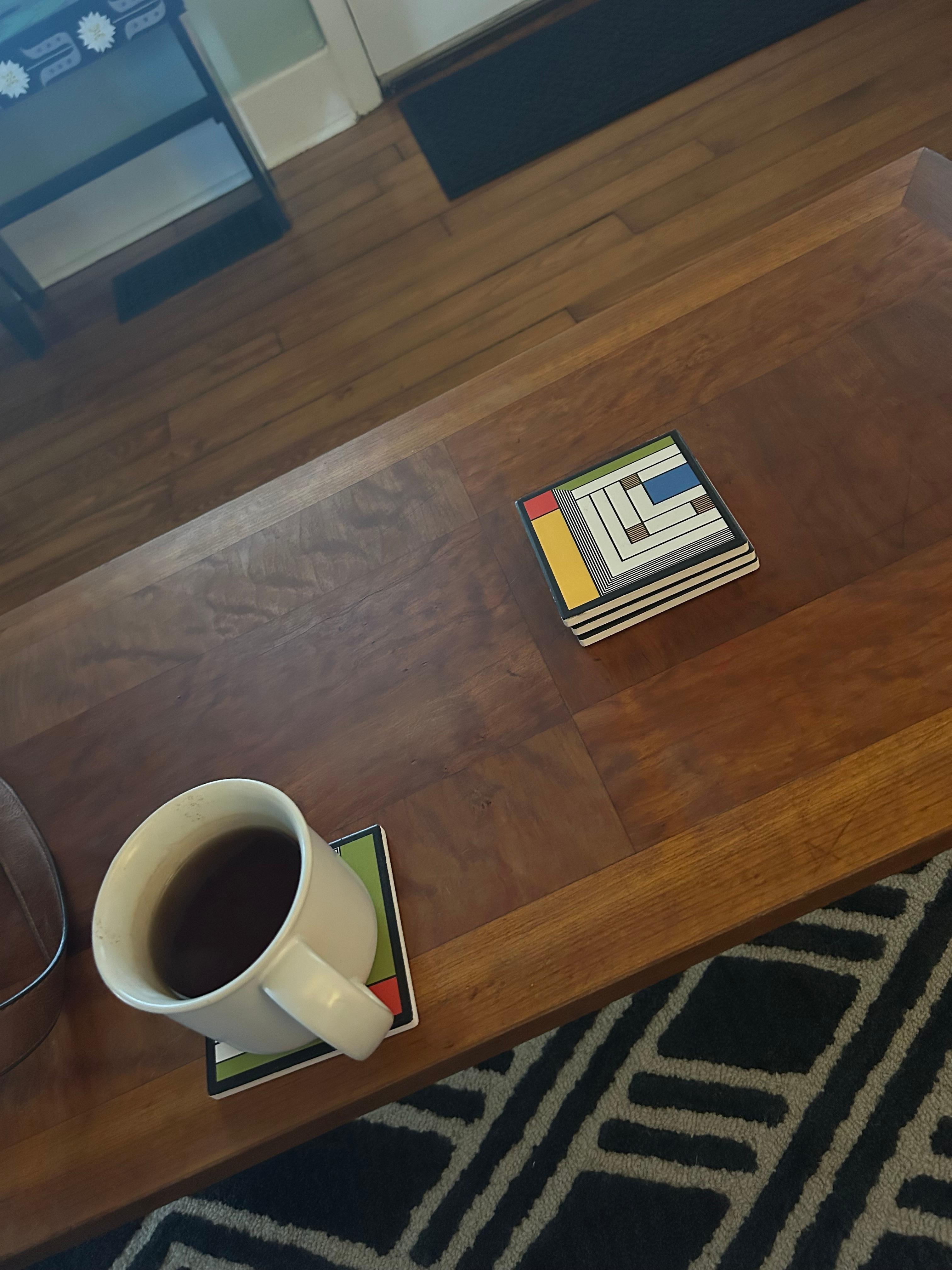 Coffee table amongst tremendously interesting and modern decor.