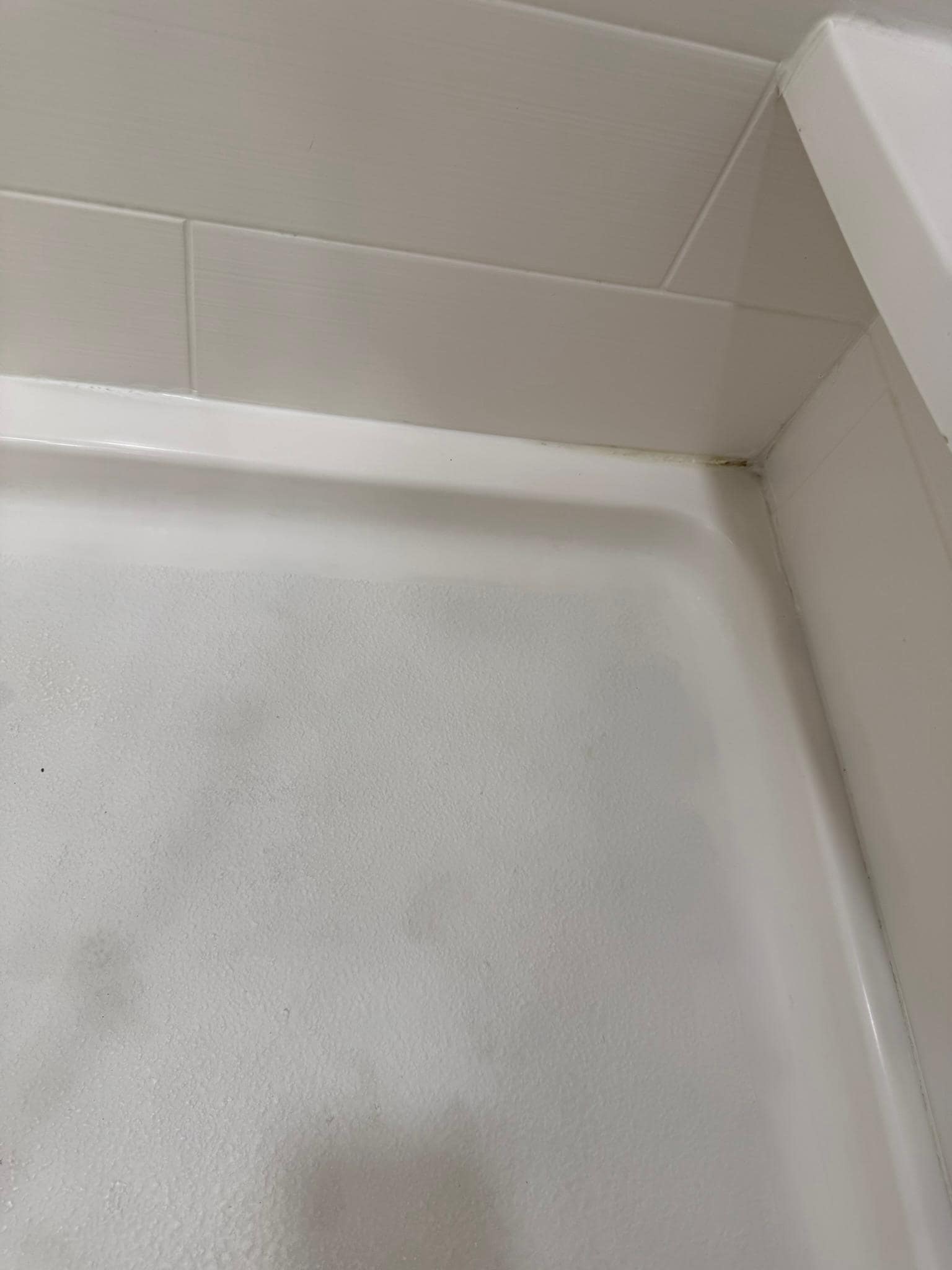 shower area needs deep cleaning to remove dirt and rust