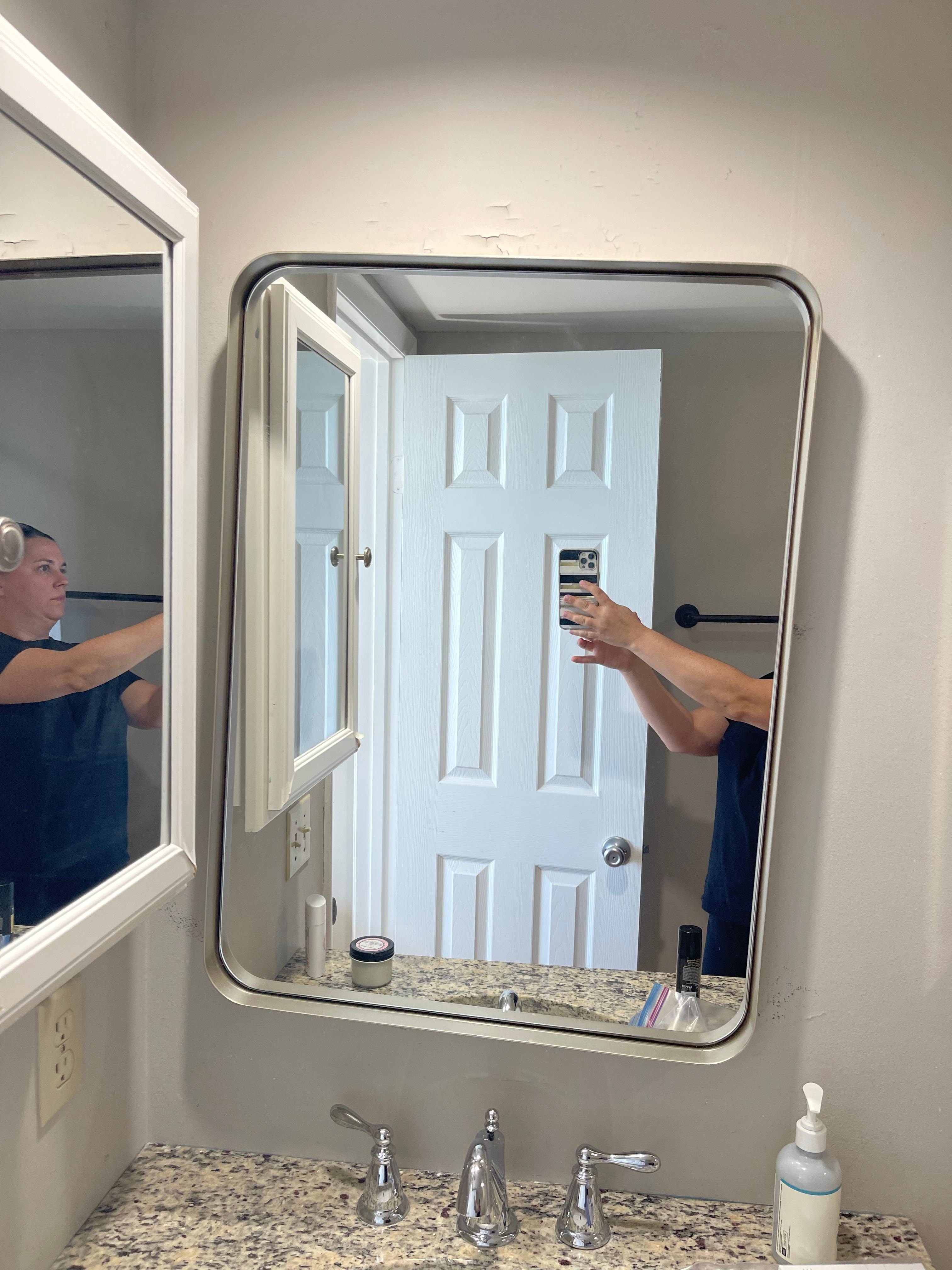 Mirror falling off wall, medicine cabinet peeling