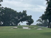 Golfing at Oyster Reef Golf Club.