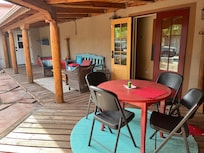 Front porch. From early coffee to late evening. So peaceful listening to the birds sing.