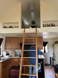 Kitchen and stairs to the loft. All beds are up in the loft