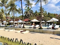 The sand in front of the pool