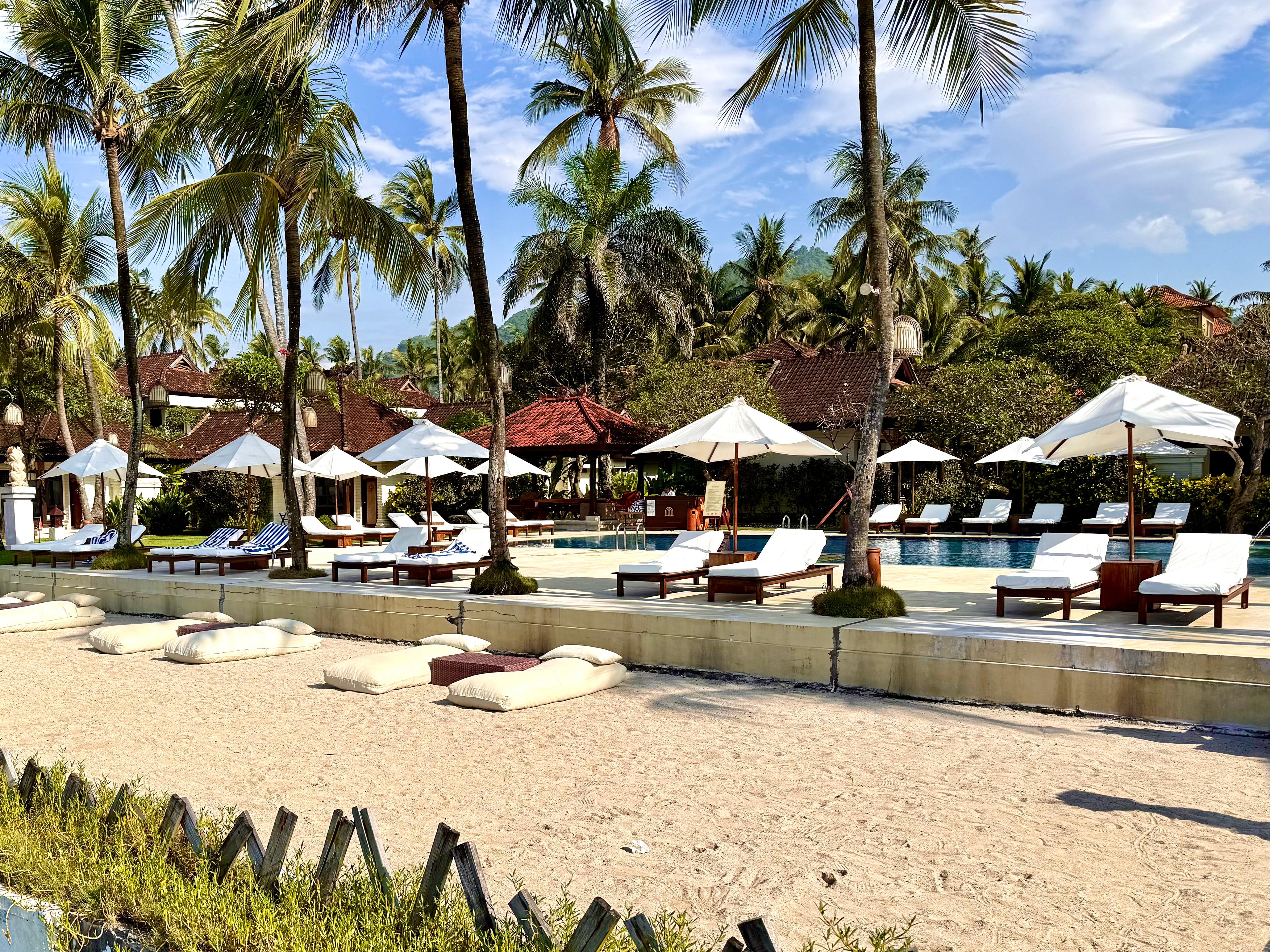 The sand in front of the pool