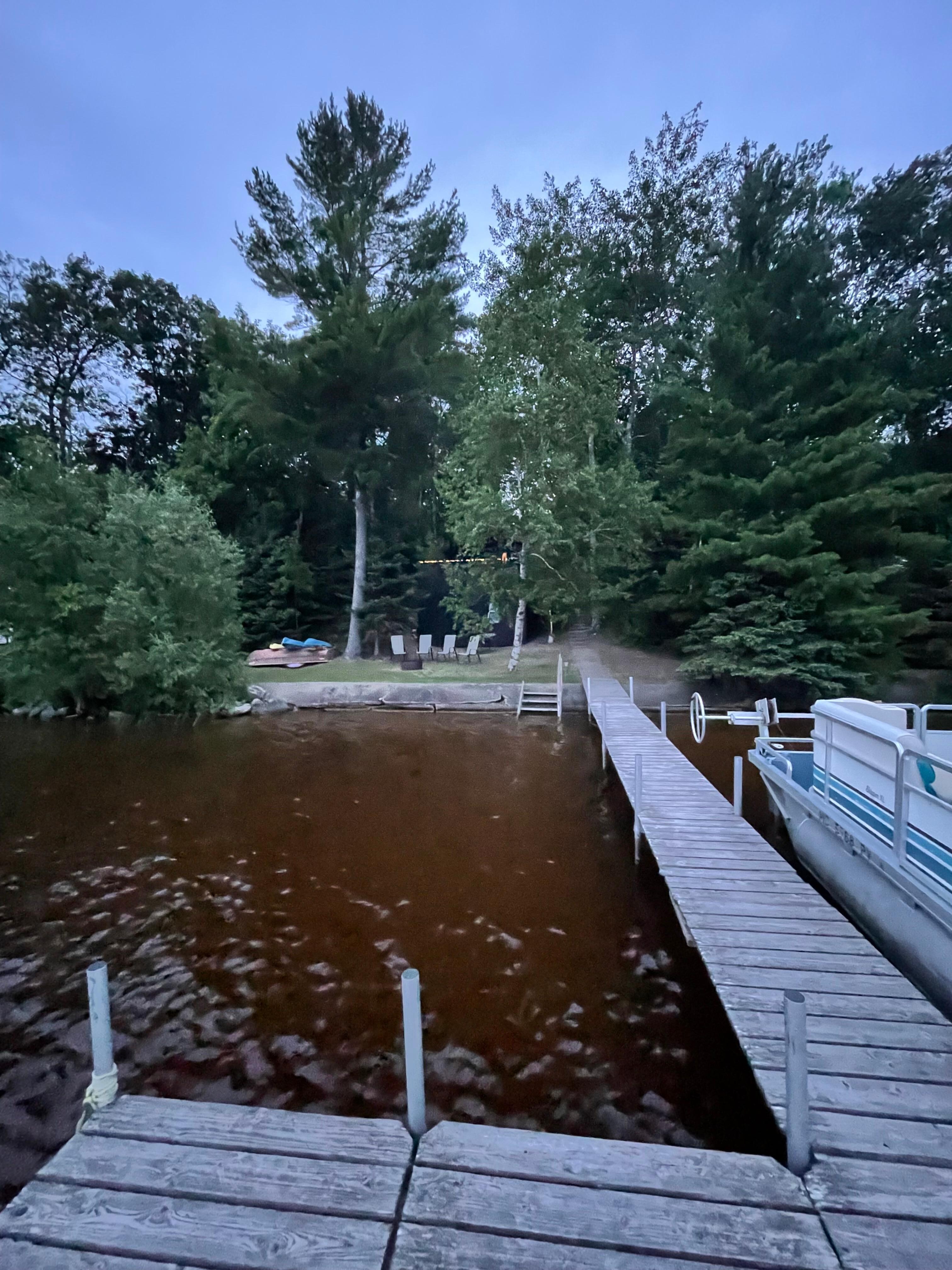 View from dock. Water is very clean, just naturally reddish from the tannins of the local soil. Good swimming conditions.