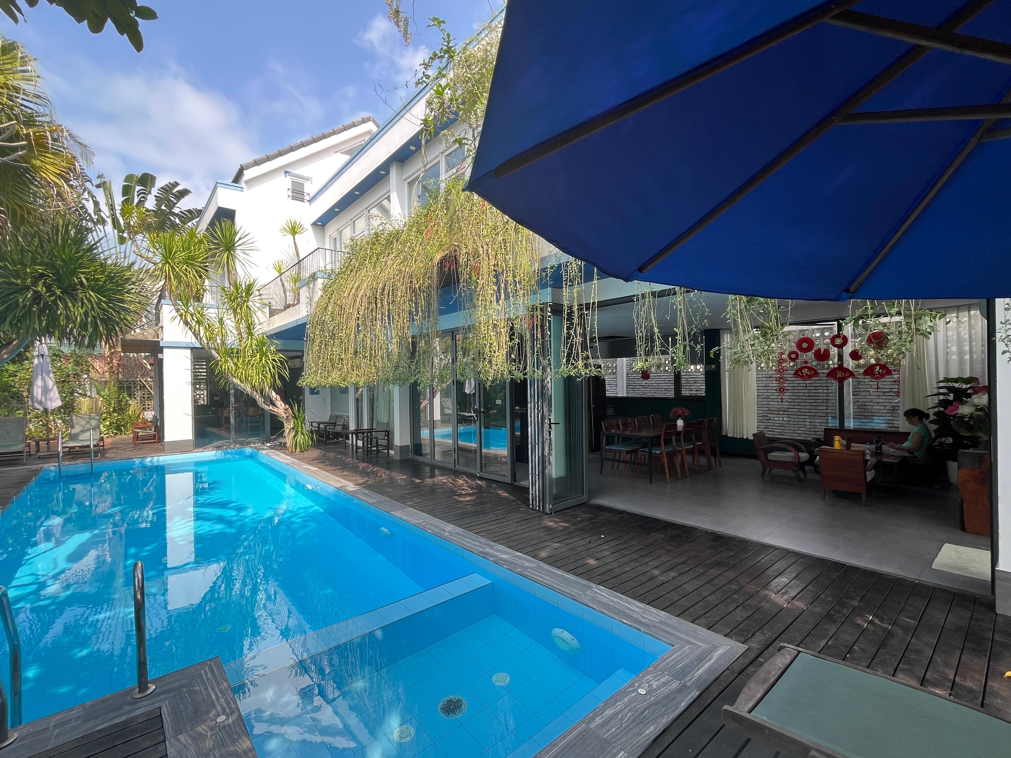 Chay Villas beautiful pool and our room up on the right. 