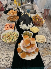 Plenty of prep space and a beautiful island for food and more seating for guests.