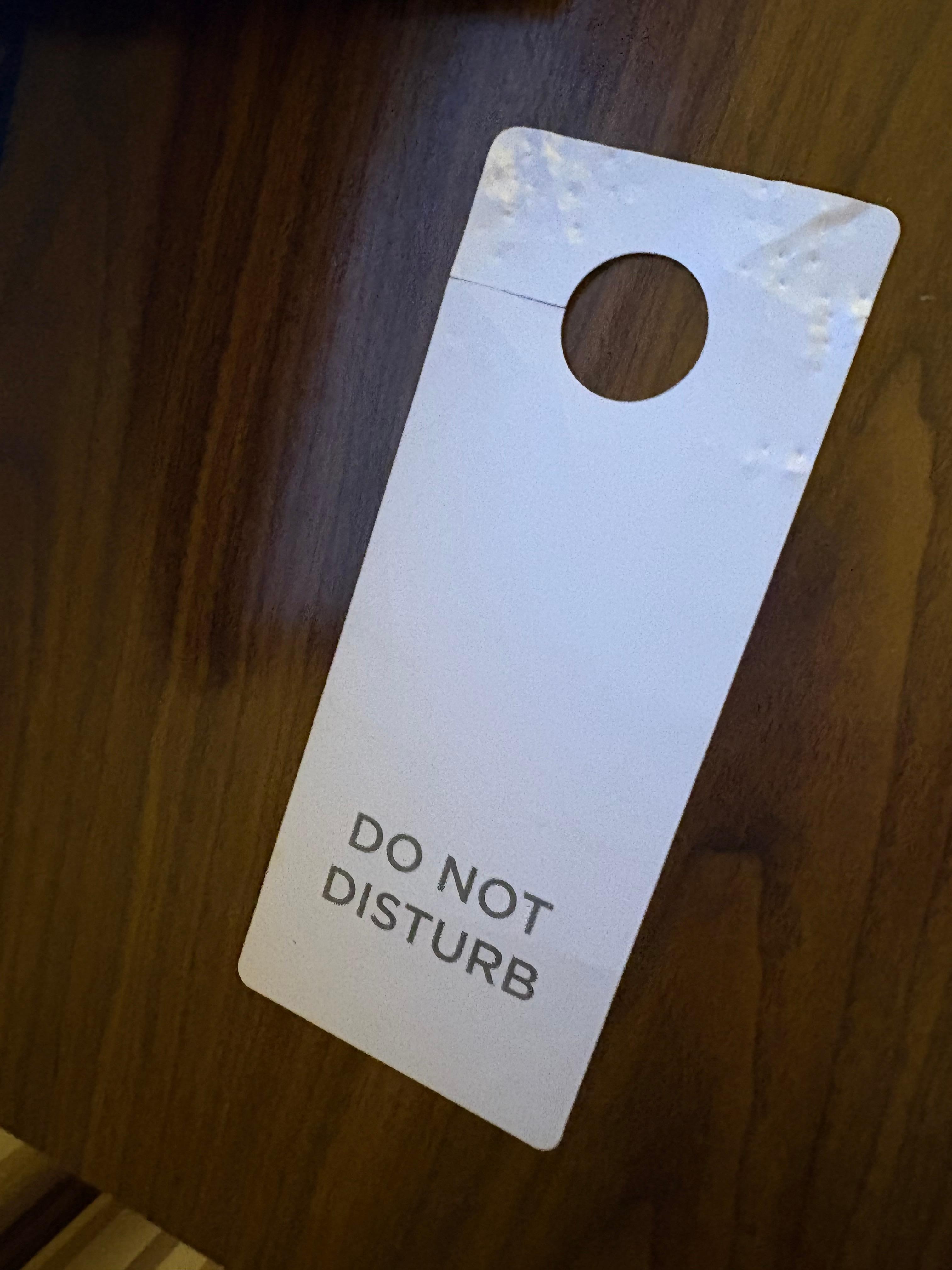Do not disturb tagged was bitten into by something. Could’ve at least replaced that. 
