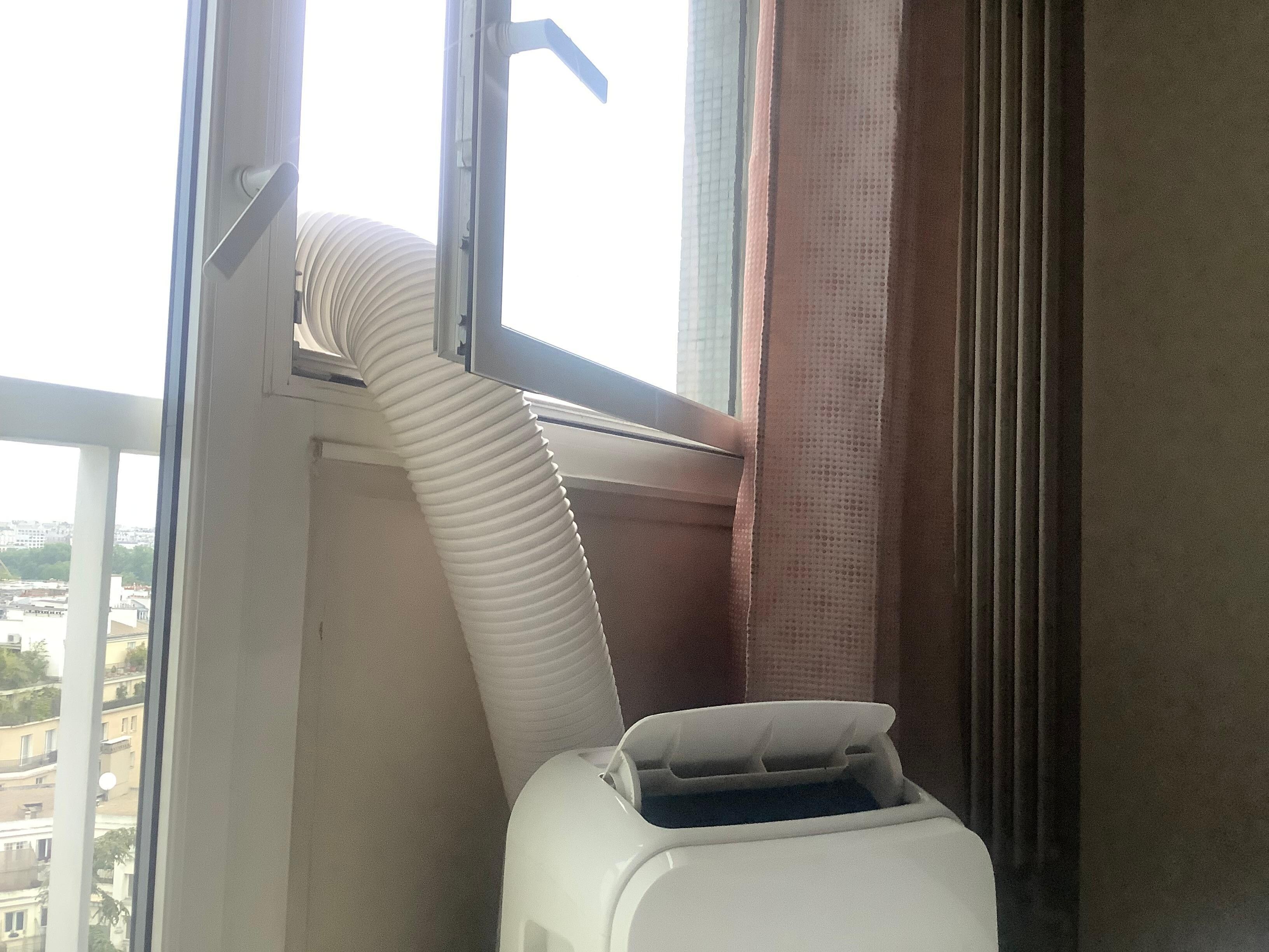 Use the string to secure around door frame and back around window handle.