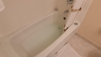 The bathtub appears to be under maintenance and did m other drain after taking a cold shower. The toilet paper holder was falling off the wall.