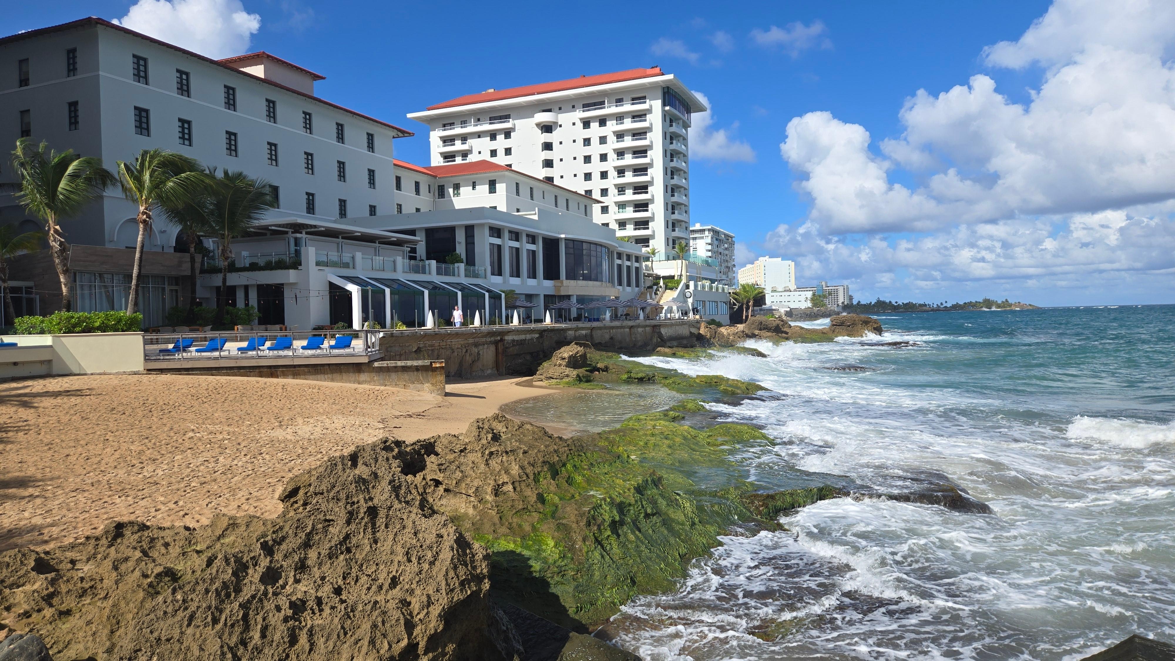 Warmed water infinity style right next to bar and awesome view