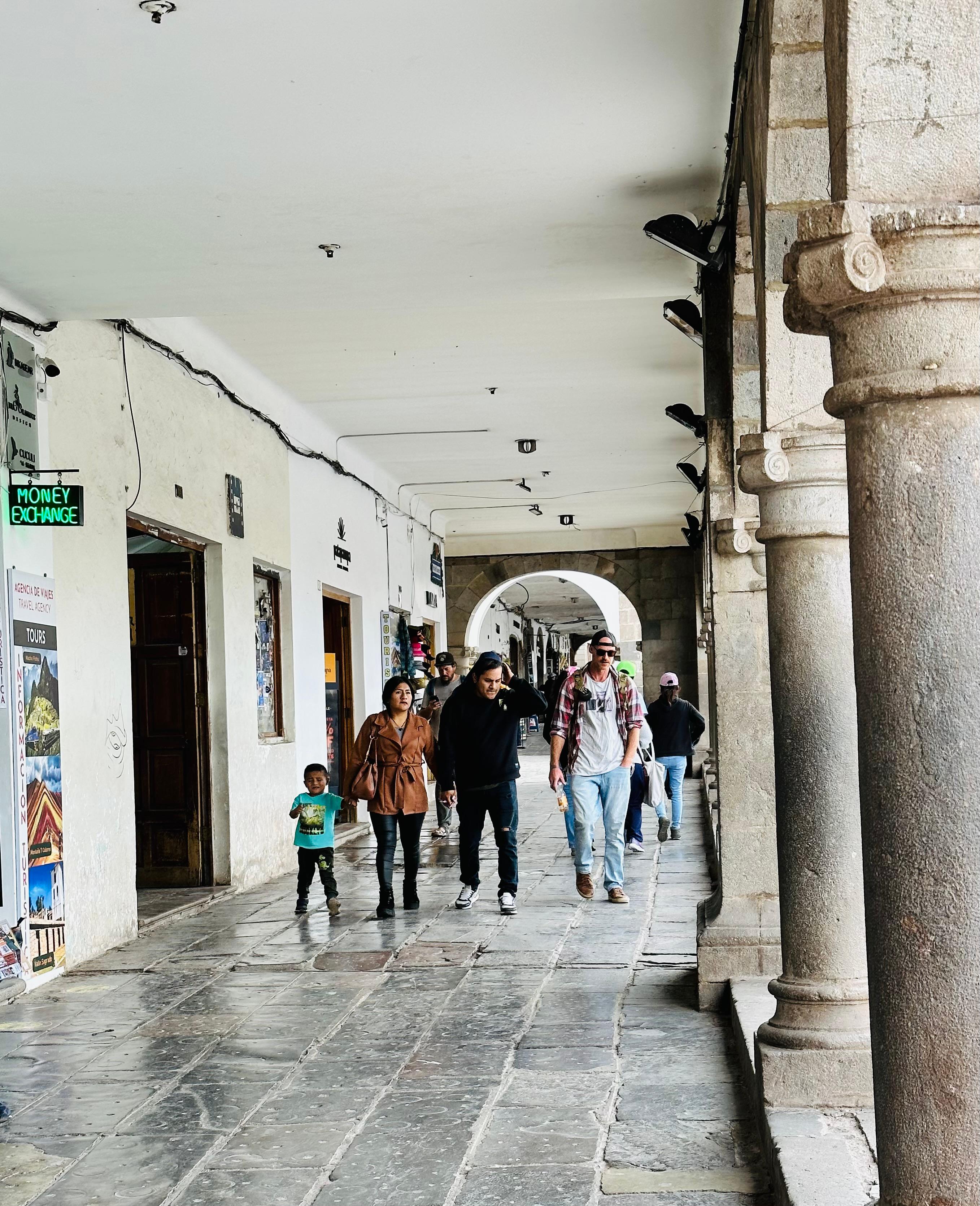 The plaza shopping was well-protected from the heat or rain