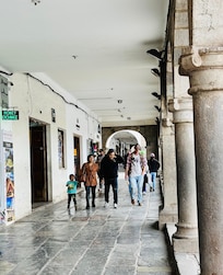 The plaza shopping was well-protected from the heat or rain