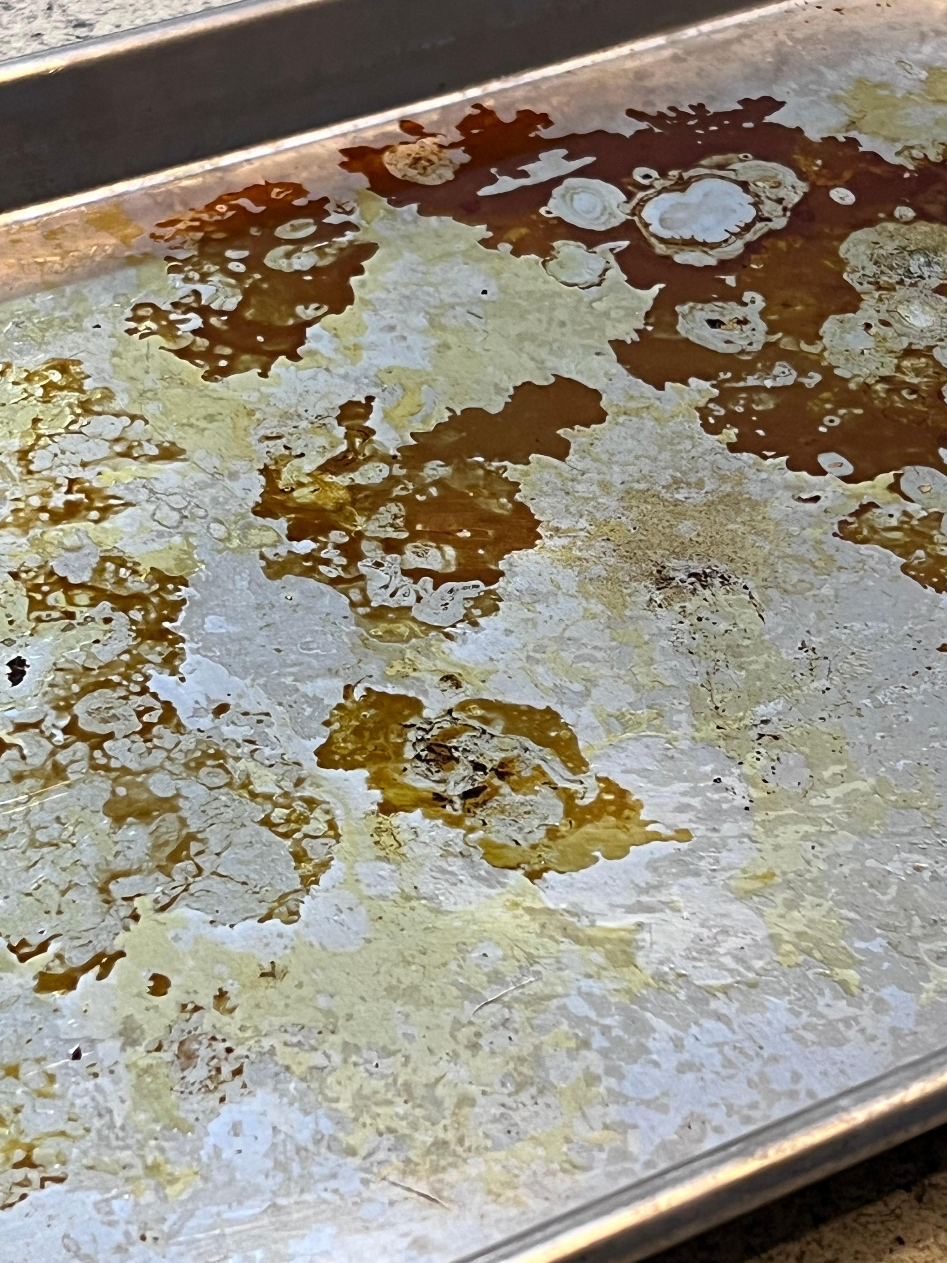(1) Disgusting pan with grease & filth in stove for usuage