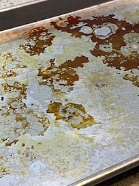 (1) Disgusting pan with grease & filth in stove for usuage