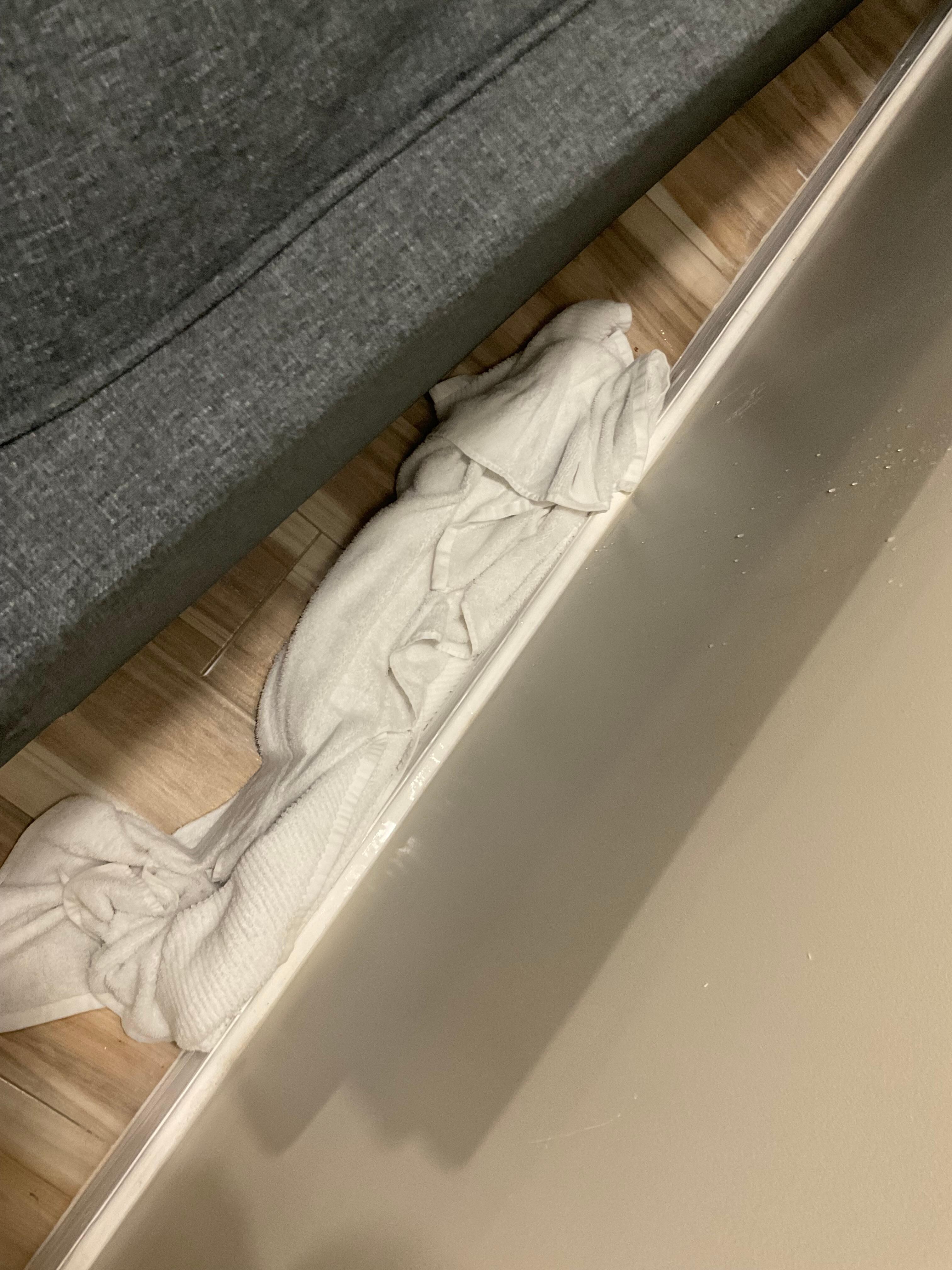 Managements âsolutionâ - dropping towels and telling us to launder and replace them to sop up the flood!