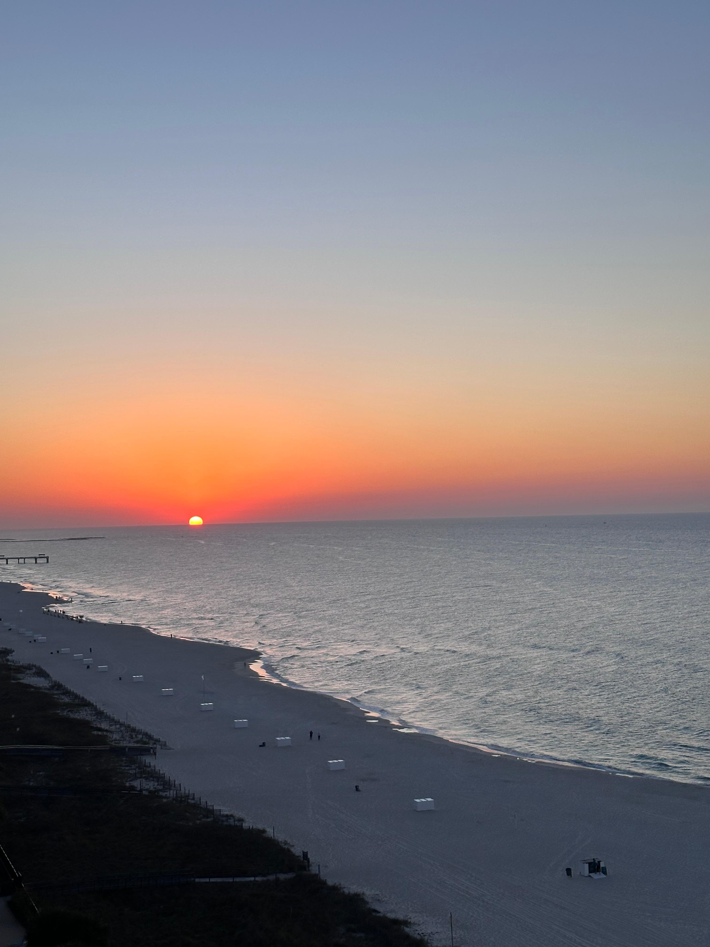 Sunrise captured from our balcony on the last morning of our stay. 