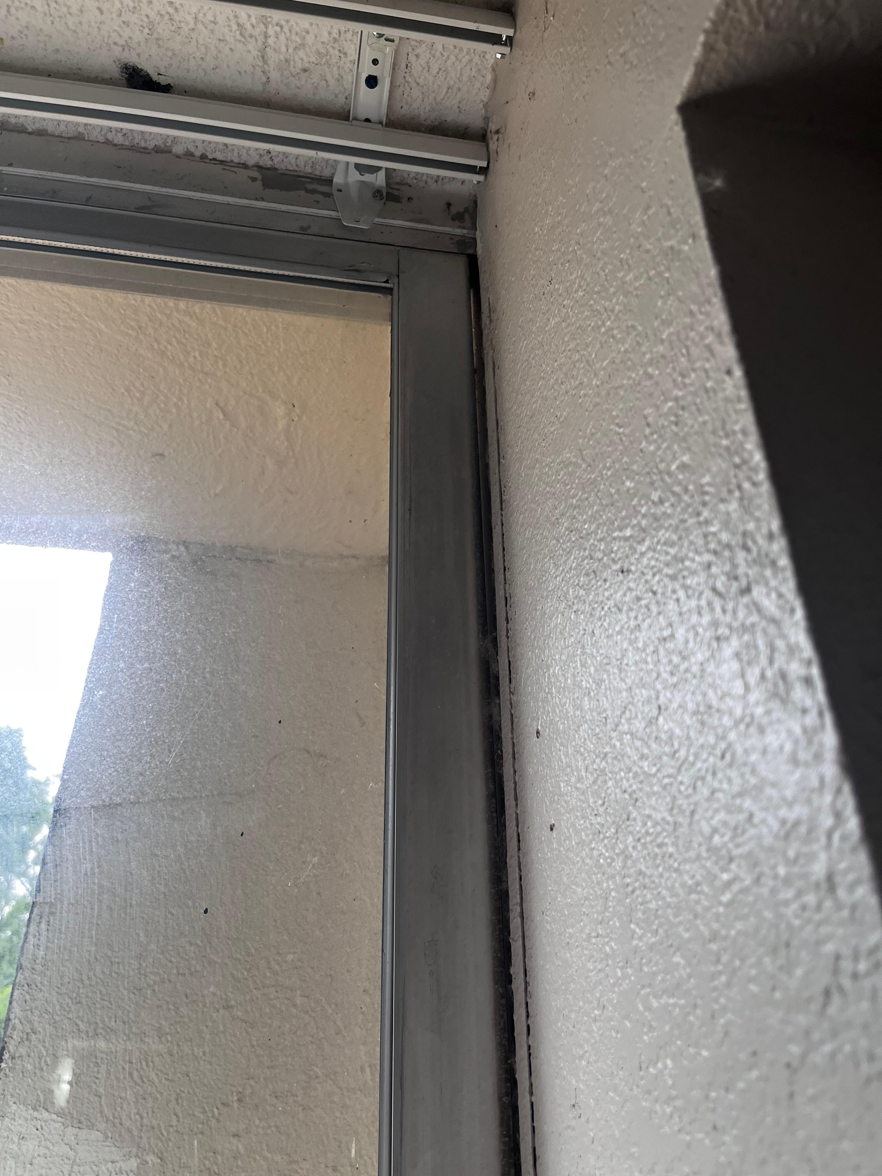 Screen door did not close completely at top