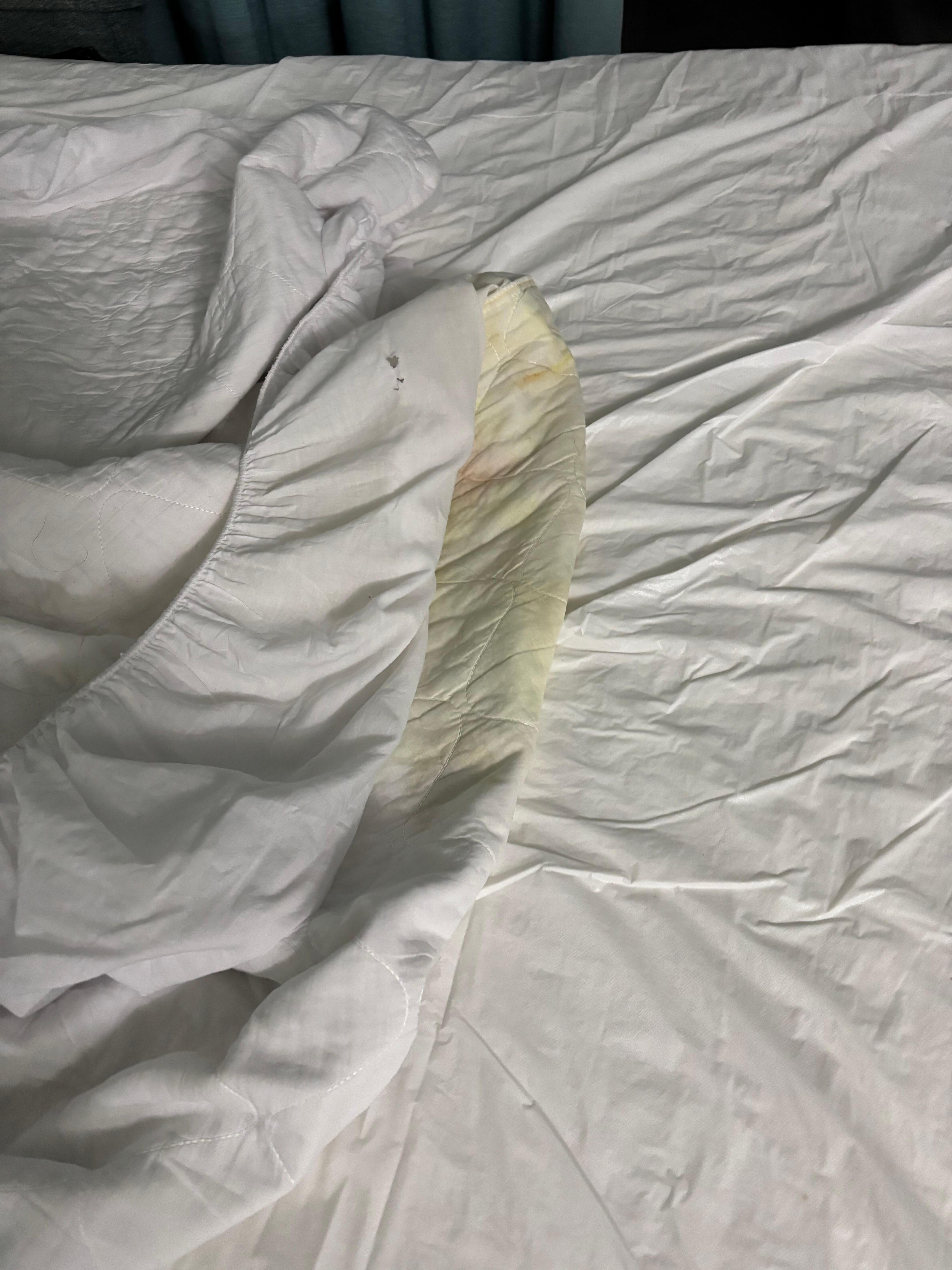 Mattress cover soiled with urine