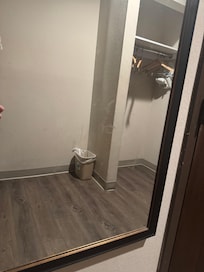 Kiss marks and hand prints on mirror