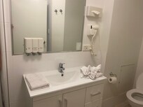 Bathroom is supplied with Shower Gel, Shampoo, Conditioner, Hand Soap, Hand Cream/Moisturiser, Shaving Gel, and a Hair Dryer. Shower gets nice and hot and has decent pressure.