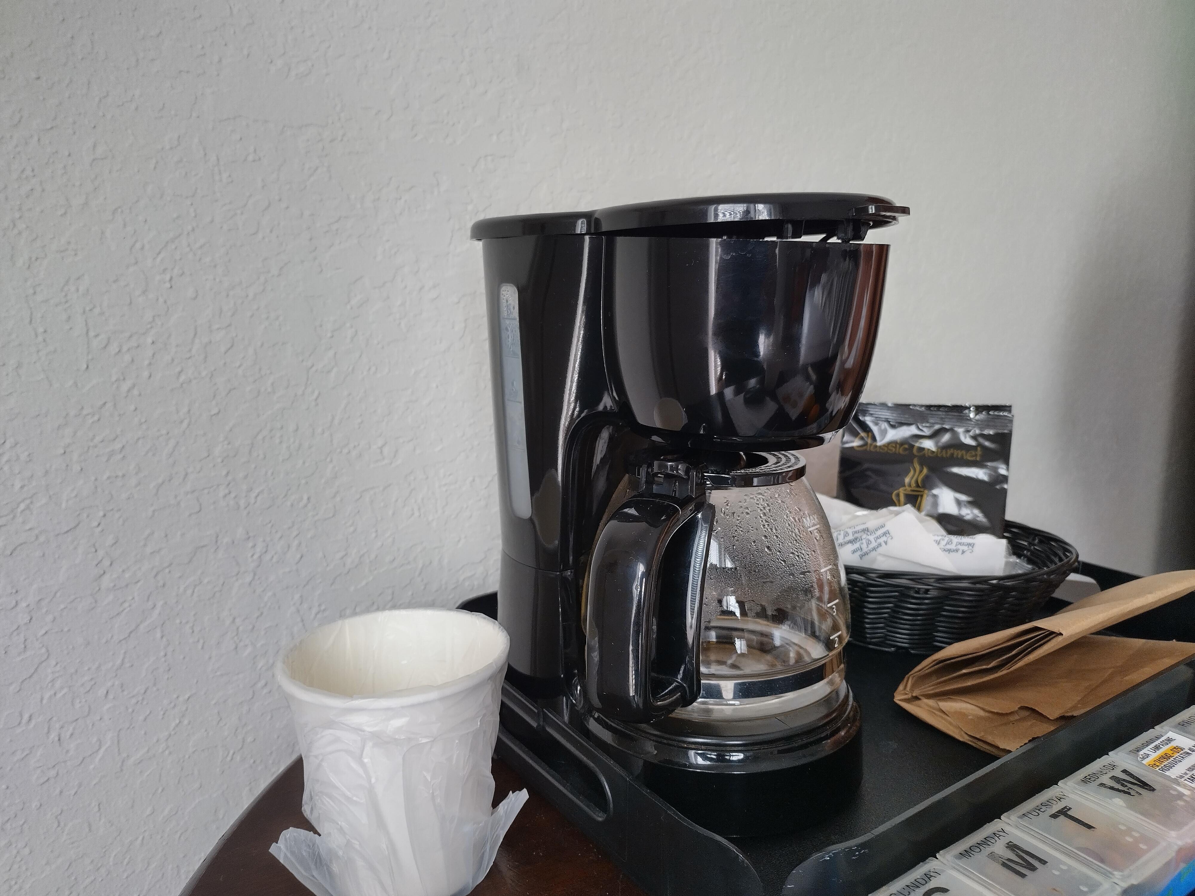Coffie maker with top that would not close as 
it was not correctly closed.