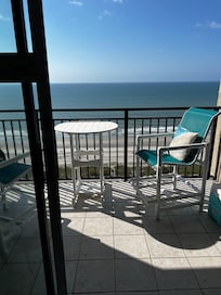 The balcony was spacious and had comfortable seating.