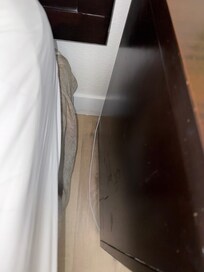 You can see the dirt on the floor and residue down the side of the side table