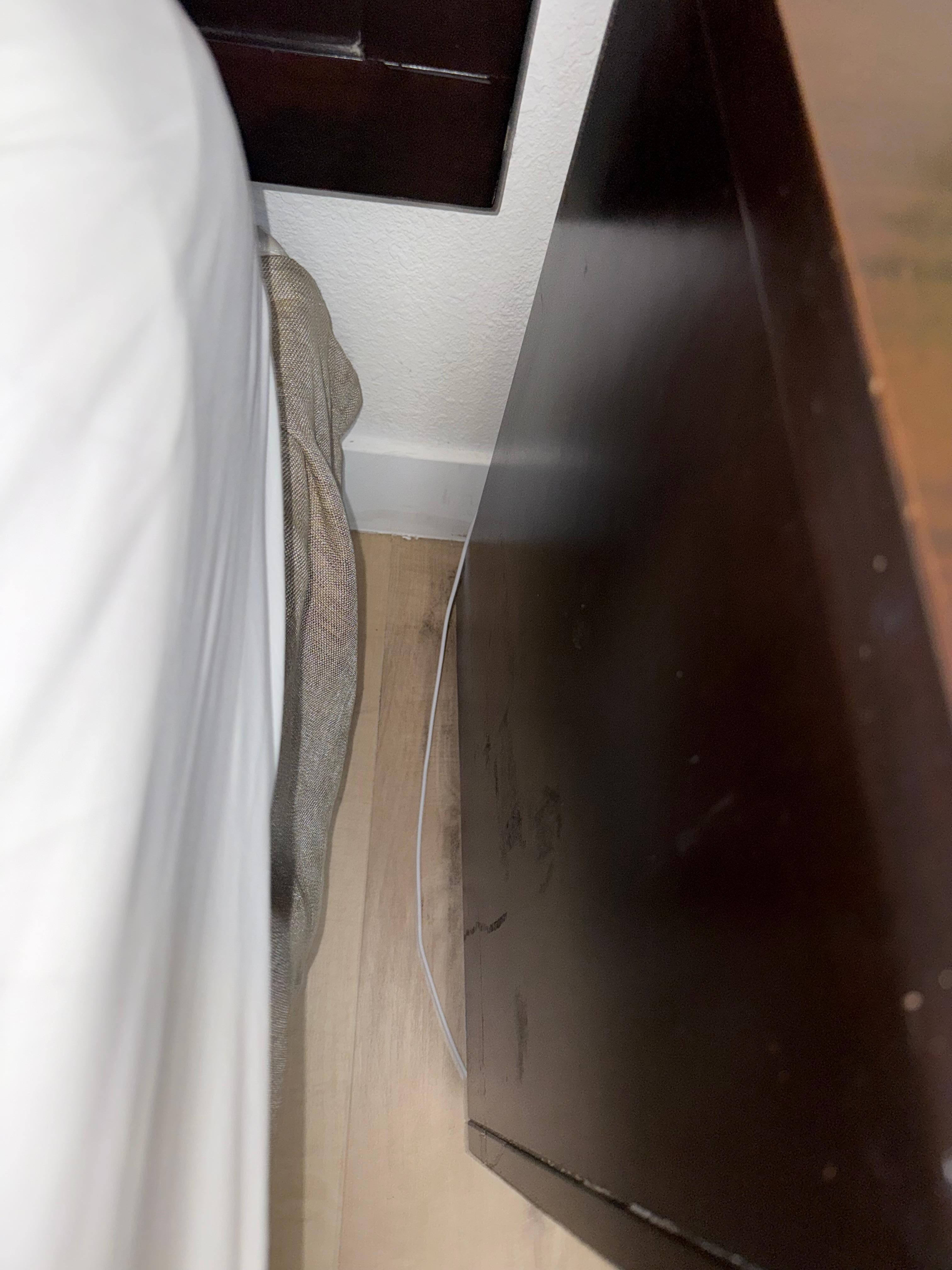 You can see the dirt on the floor and residue down the side of the side table