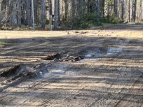 Mud road in front of property