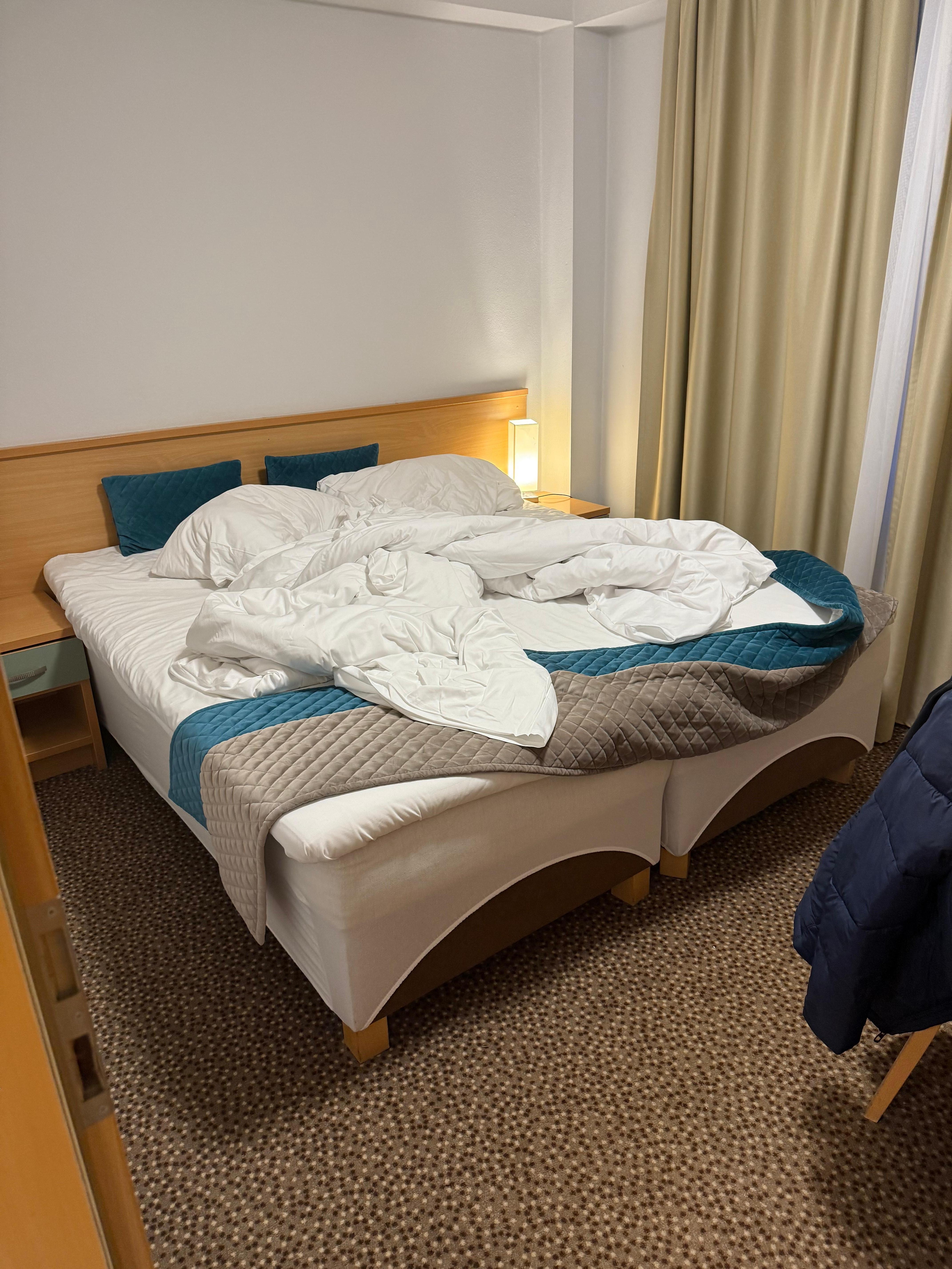 Just the space to walk around the bed, no extra room to open/put suitcases 