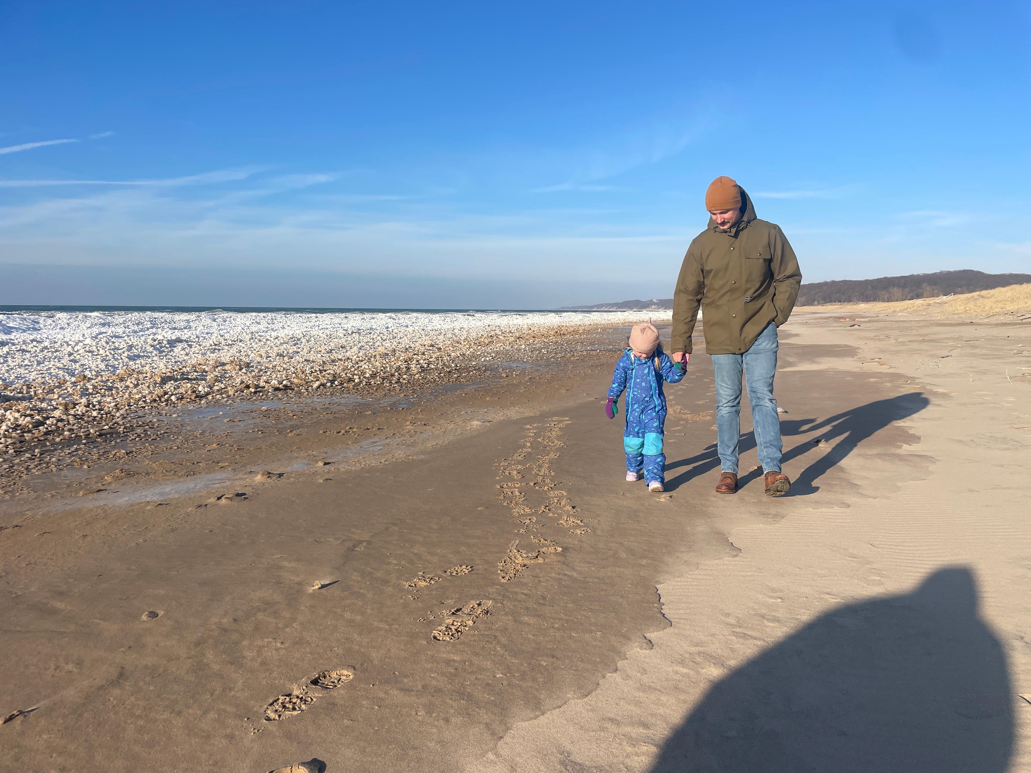 Bundled up and walking the beach.
