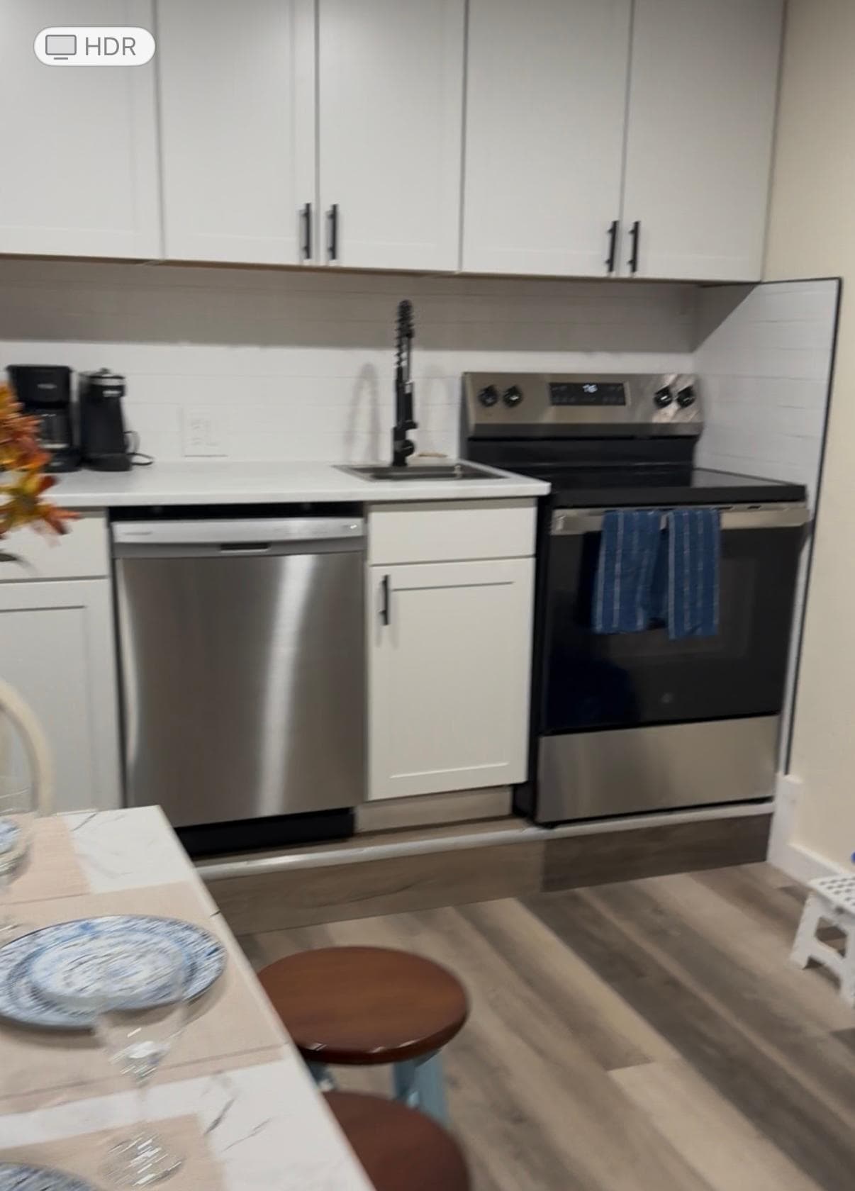Kitchen with tiny sink (not the same as pictured in listing)