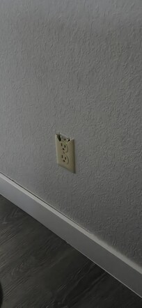 Broken Outlet Cover (room 2)