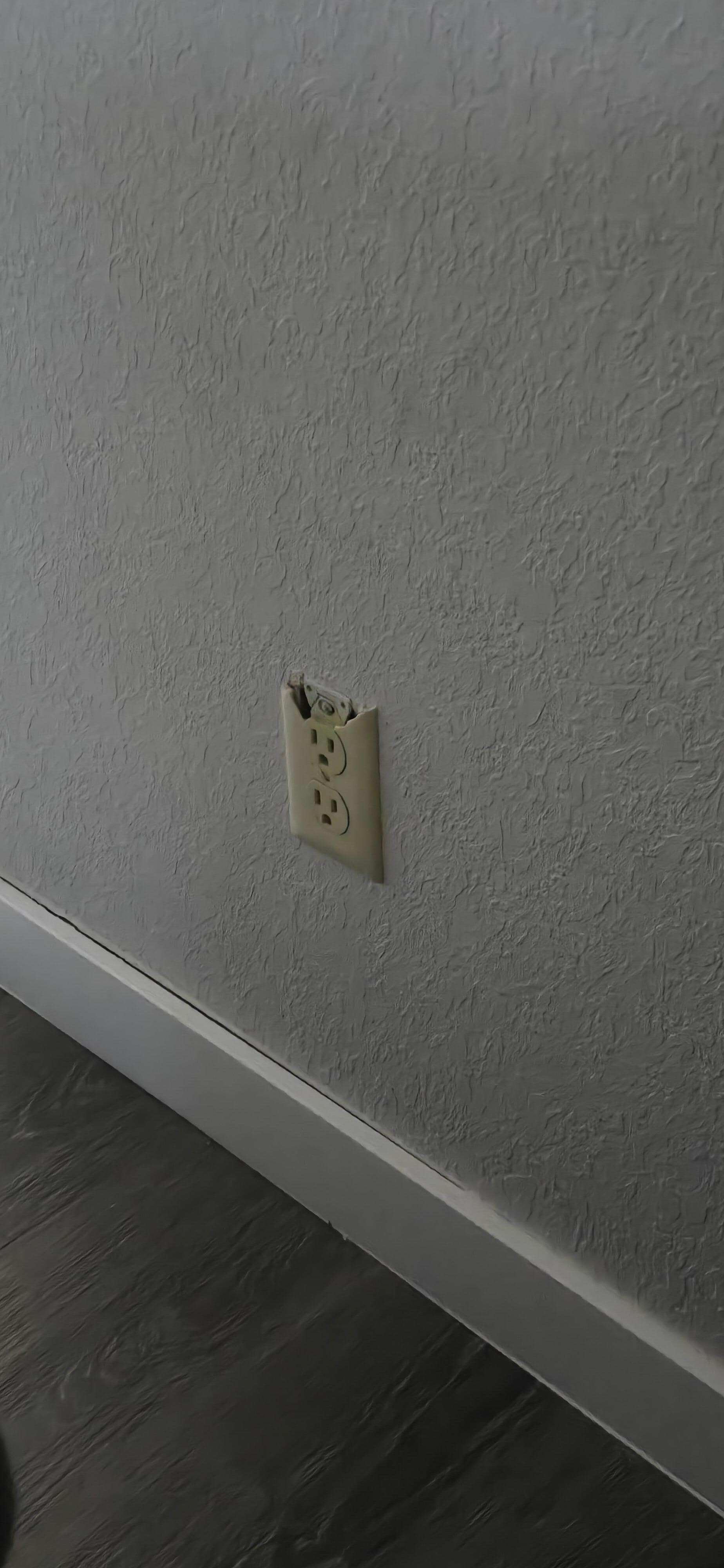 Broken Outlet Cover (room 2)