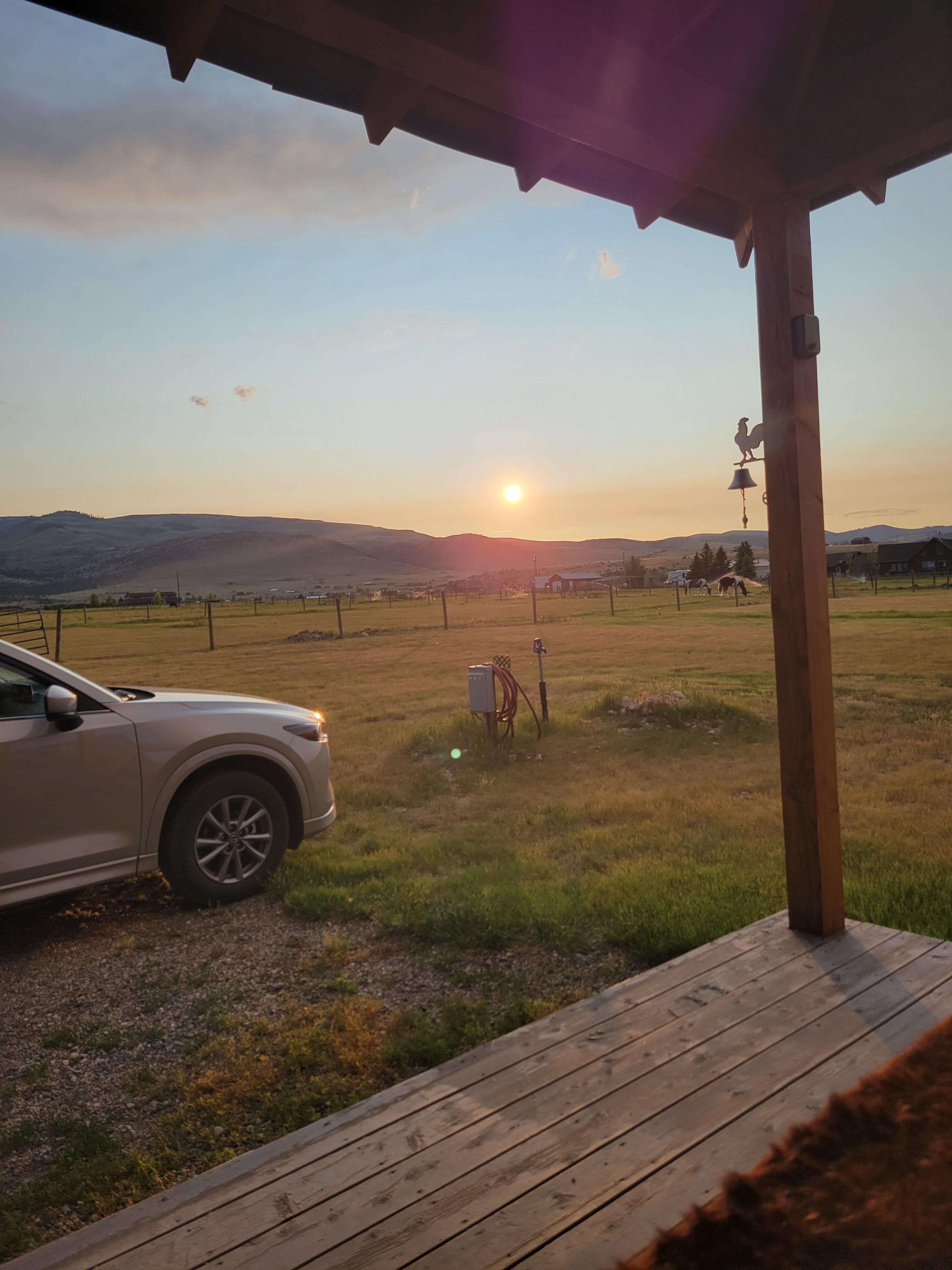 Sunset in June from side porch.