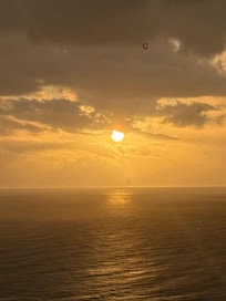 Sunsets are beautiful from the balcony.