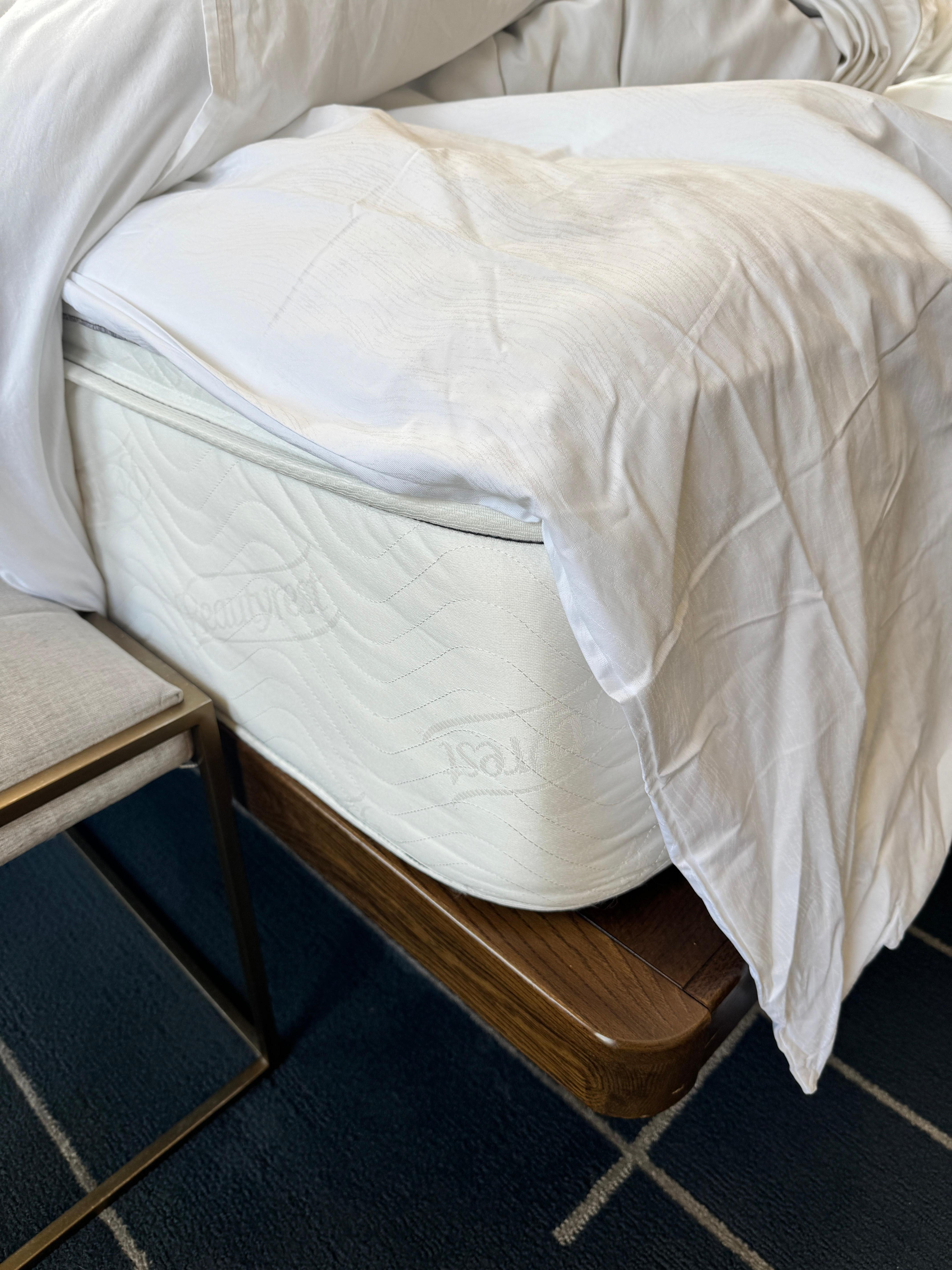 No bottom sheet on the bed, just an empty duvet cover draped over the bare mattress. Stayed 3 nights and no fitted sheet was ever put on the bed. 