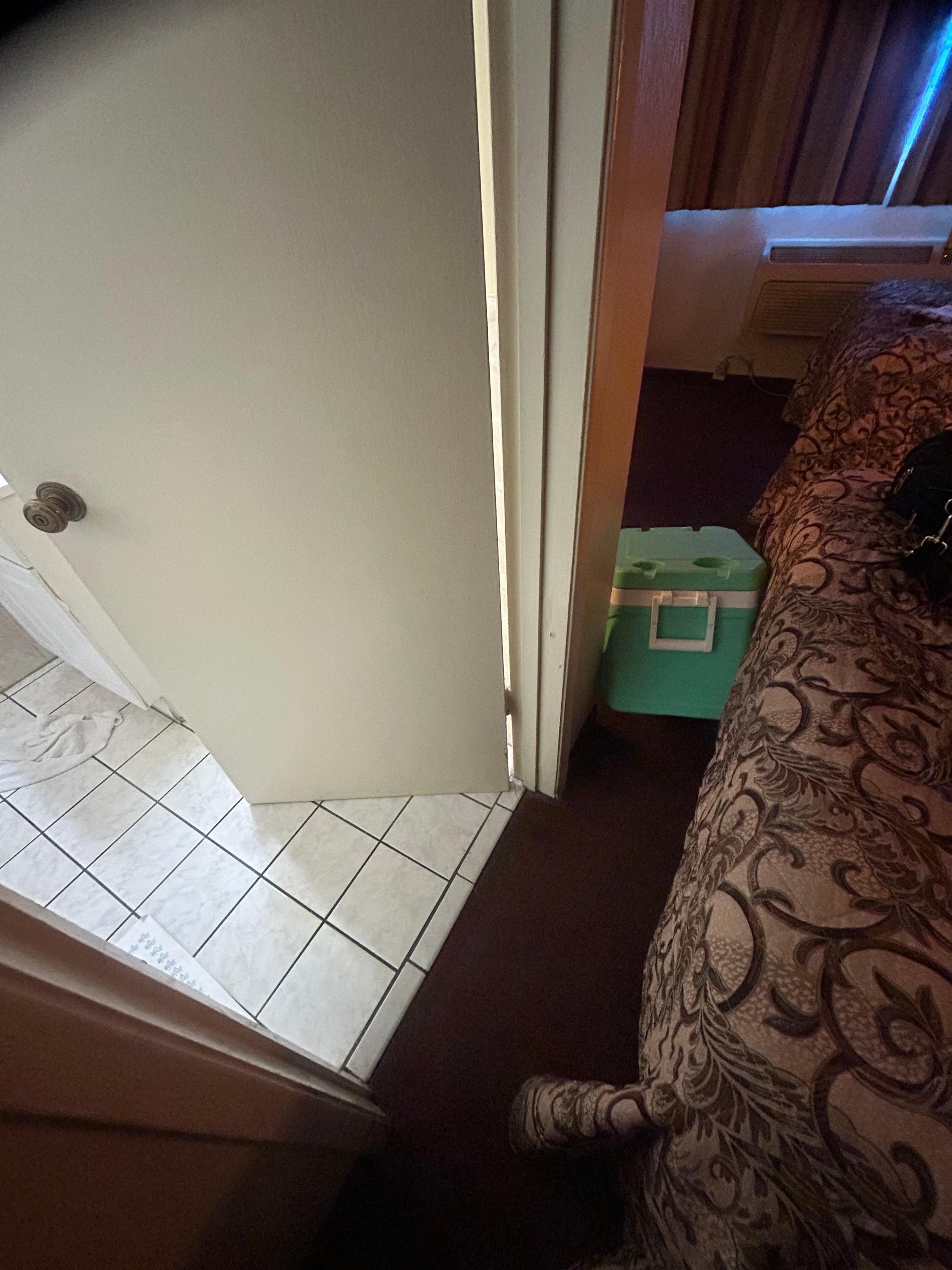 Clearance b/w bed and bathroom door